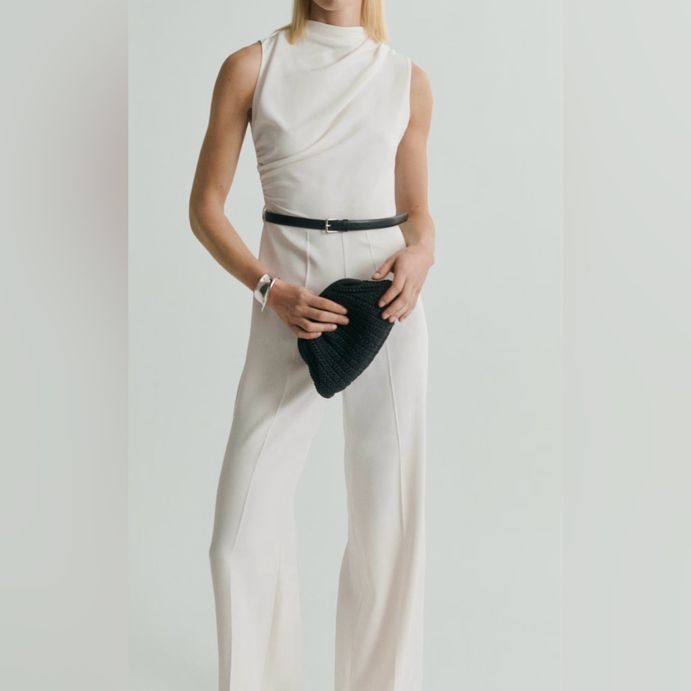 Mango 

LONG JUMPSUIT WITH DRAPED NECK AND BELT